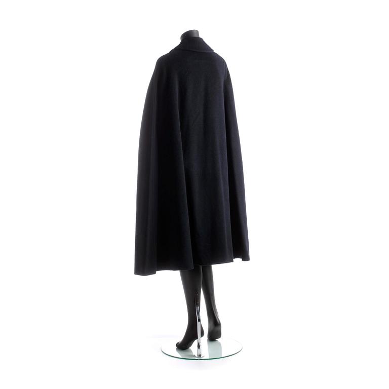 CÉLINE, a dark blue wool blend cape.