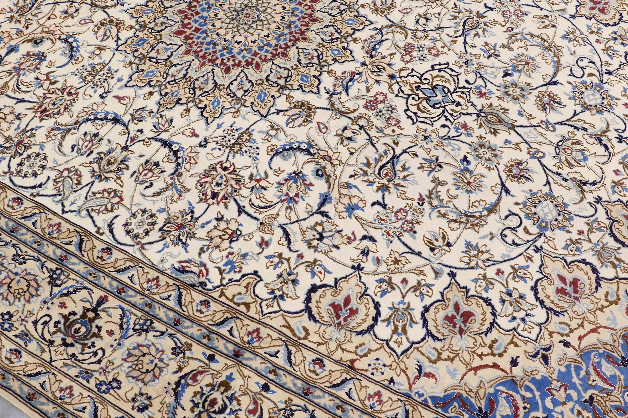 A carpet, Nain part silk, 364 x 256 cm.