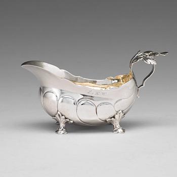 132. A Swedish 18th century parcel-gilt silver cream-jug, mark of Jonas Thomasson Ronander, Stockholm 1768.