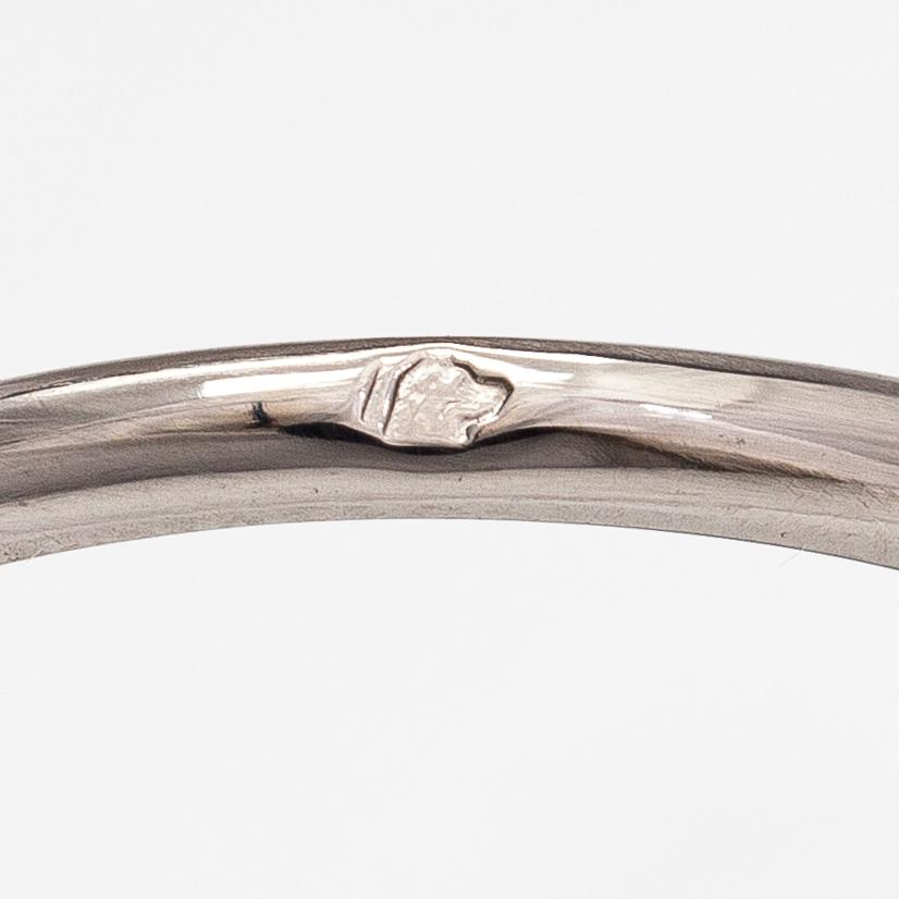 Cartier, A platinum ring with a ca. 0.27 ct diamond according to certificate. Marked Cartier, 51, 62039B.
