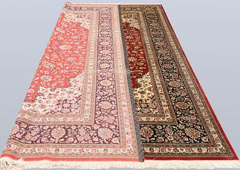 A silk Ghom carpet, c. 346 x 247 cm.