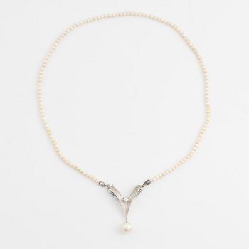 Necklace and earrings, a pair, cultured pearls, white gold, and brilliant- and octagon-cut diamonds.