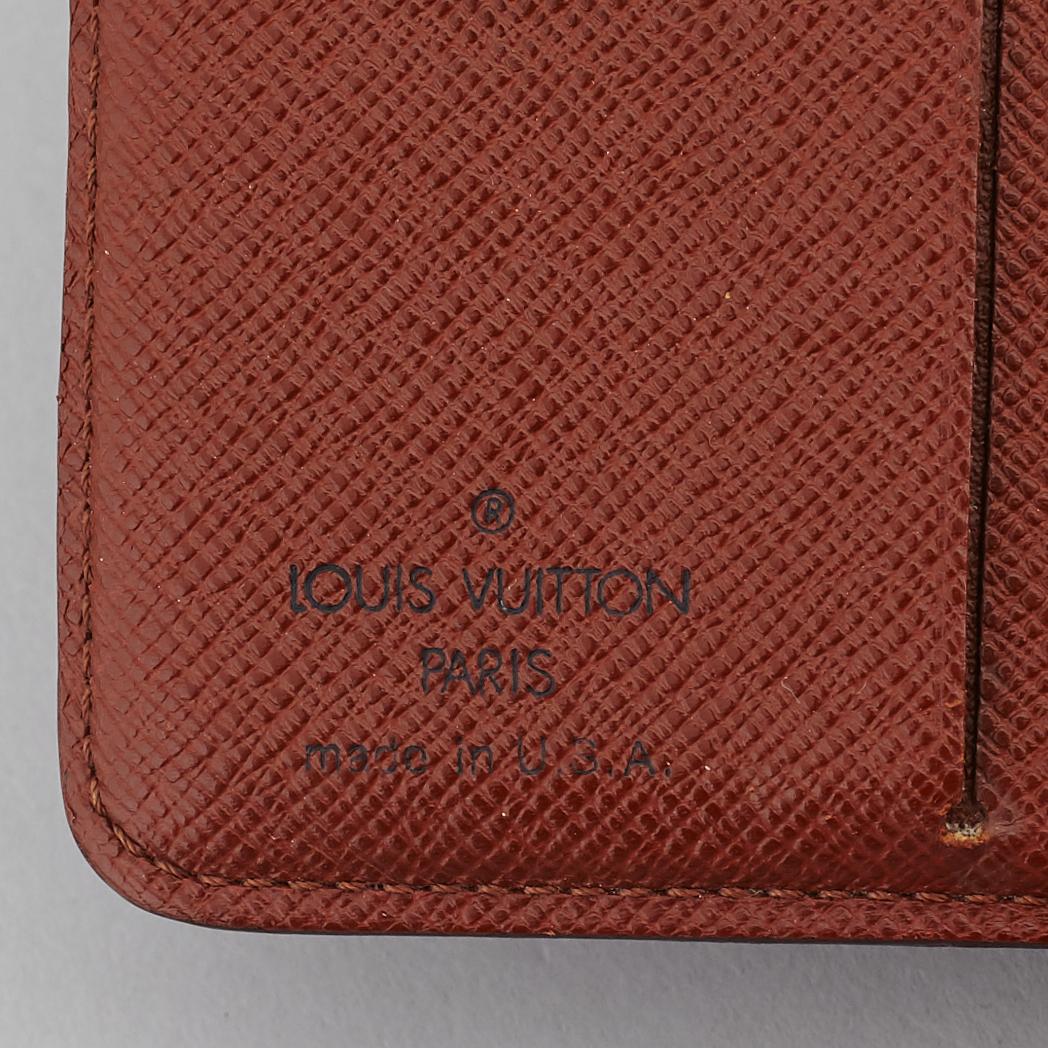 LOUIS VUITTON, a monogram canvas wallet.