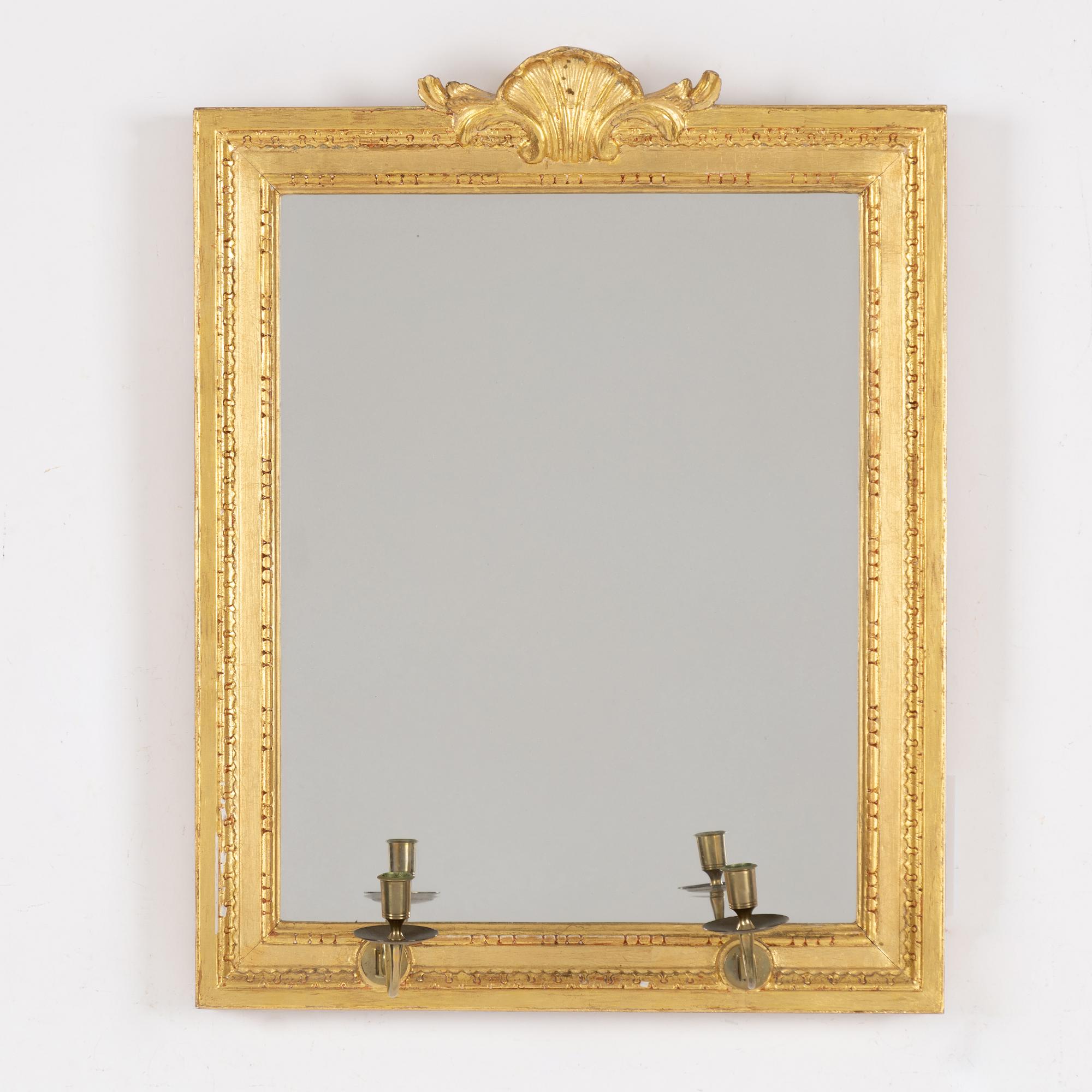 A "Meunier" mirror wall lamp from IKEA's 18th-century series, late 20th century.