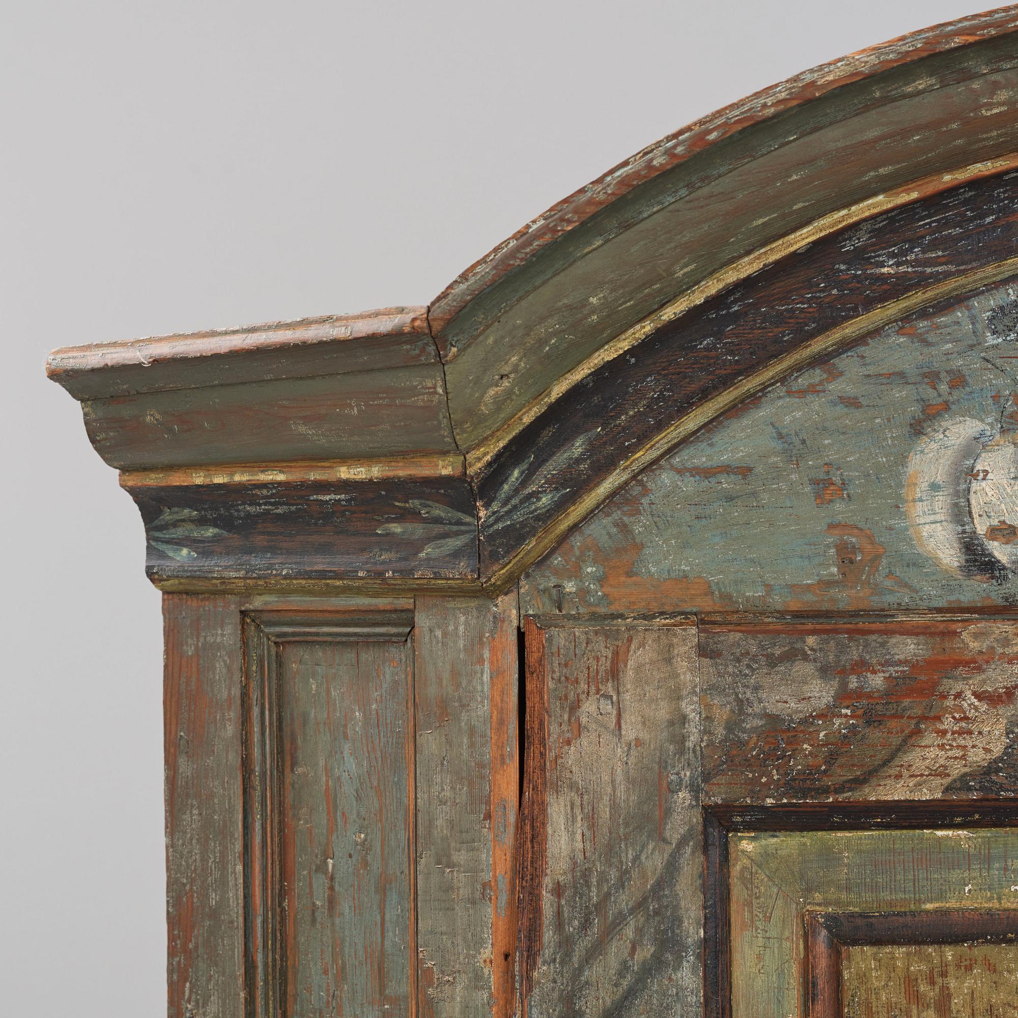 A Swedish polychrome-painted corner cabinet attributed to J. Bäckström (1773-1837).