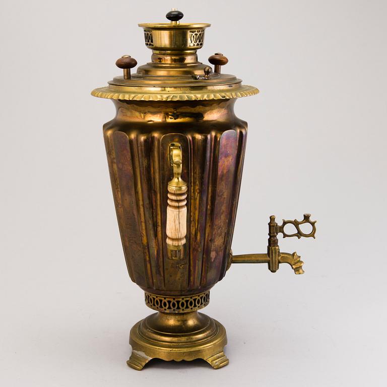 A Russian brass and copper samovar, around 1900.