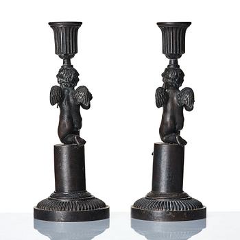 A pair of German (Berliner Eisen) Empire iron candle sticks.