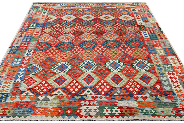 A Kilim carpet, c. 393 x 300 cm.