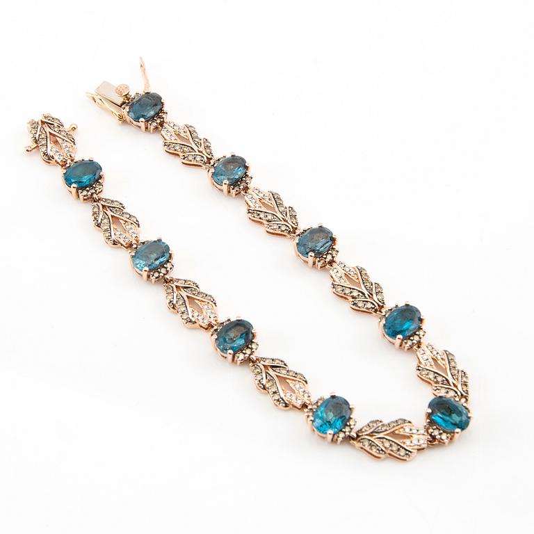 Bracelet in 14K rose gold with round brilliant-cut diamonds and oval faceted topazes, LeVian.