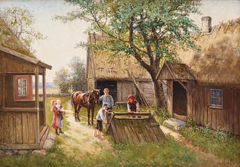 738. Severin Nilson, Family picture at the farm's well.