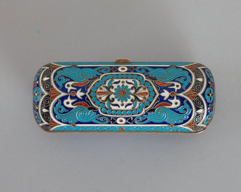 A Russian 19th century silver-gilt and enamel cigarette-case, makers mark of Ivan Chlebnikov, Moscow.