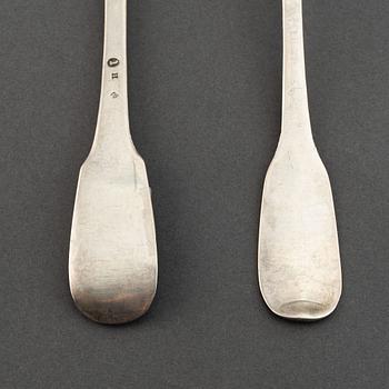 A matched set of nine 18th century silver spoons, marked Basel and Naunur (Belgum).