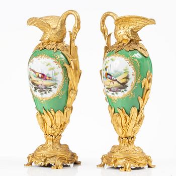 A pair of Louis XV-style gilt bronze and porcelain decorative ewers, France, later part 19th century.