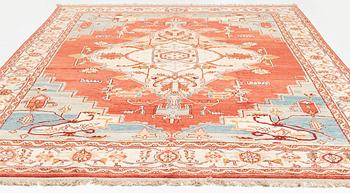 A Heriz design carpet 393 x 293 cm.