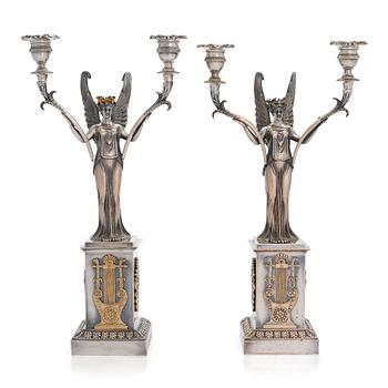 A pair of Empire silver plated bronze candelabra, first half of the 19th century.