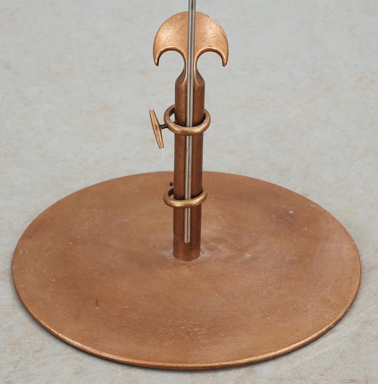 A Tore Ahlsén bronze and white metal floor lamp, 'Napoleon on the Nile', probably executed by NK, 1940's.