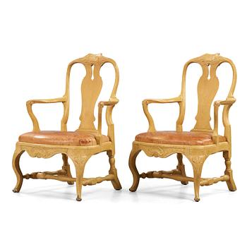 35. A pair of Swedish Rococo 18th century armchairs.