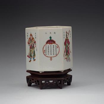 A famille rose hexagonal figure scene brushpot, Qing dynasty, 19th Century.