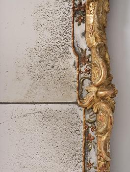 A Swedish giltwood and polychrome-painted Rococo mirror, later part of the 18th century.