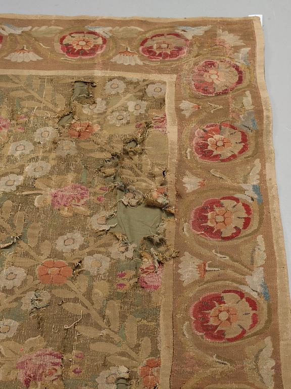 A CARPET, tapestry weave, ca 561-564,5 x 354-360 cm, Aubusson, France the middle to the end of the 19th century.