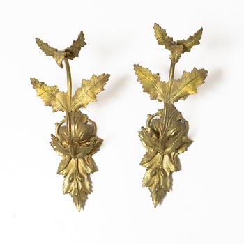 A pair of Oscarian wall appliques, late 19th century.