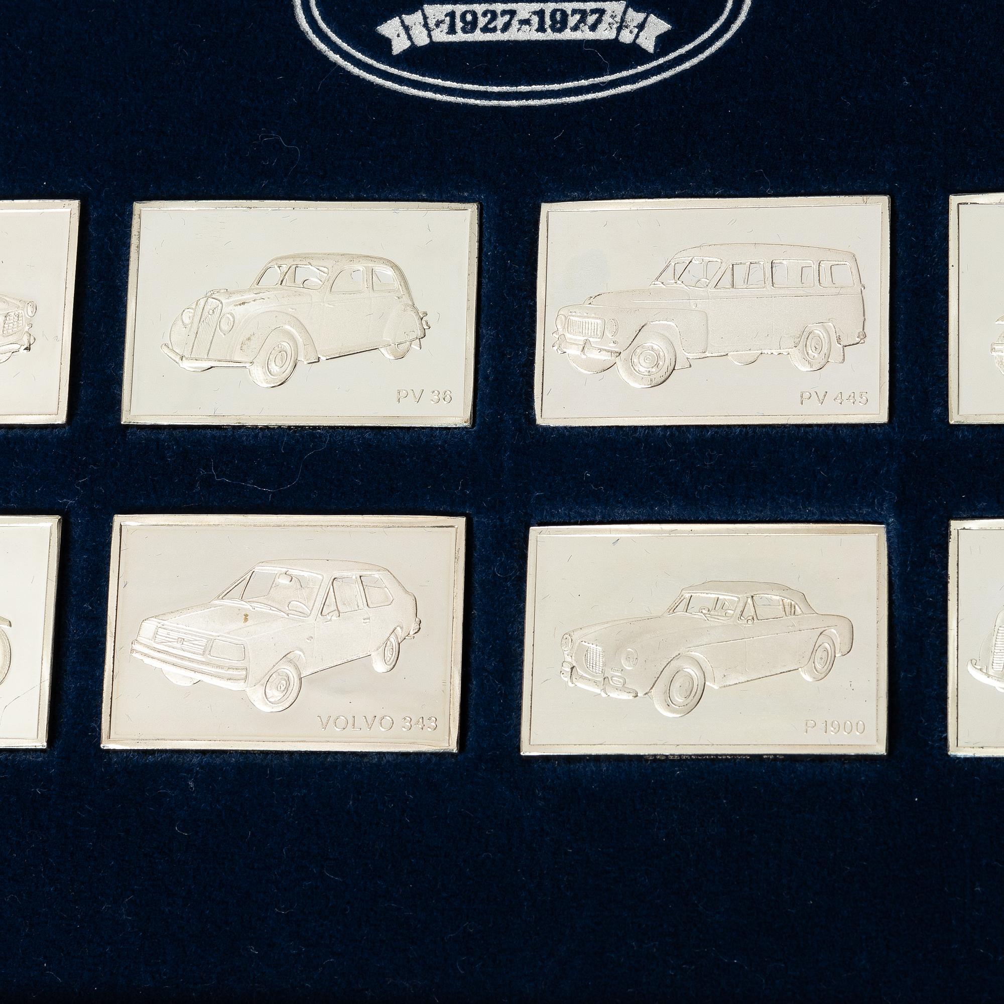 Plaketter, 12 st, silver, "De Historiska Volvobilarna 1927-1977", Franklin Mint.