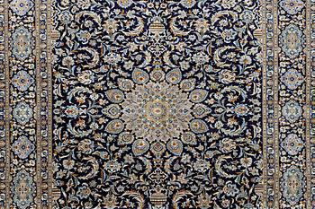 A Kashan carpet, c. 410 x 311 cm.