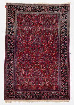 A Keshan rug, c. 200 x 135 cm.