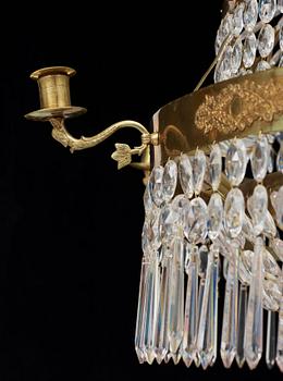 A Swedish Empire 19th century nine-light chandelier.