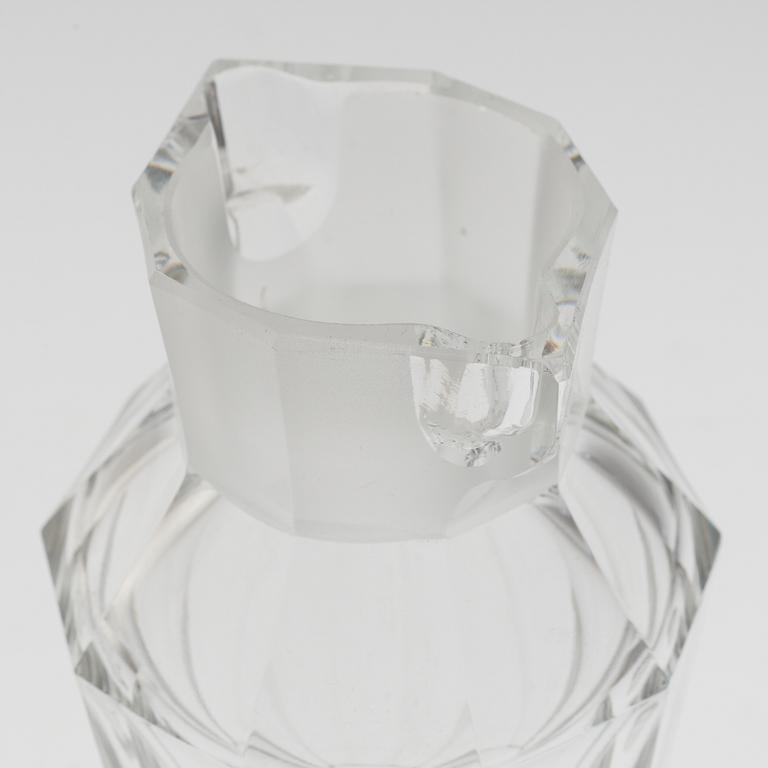 A set of twelve glasses and a cocktailshaker by Elis Berg, Kosta.