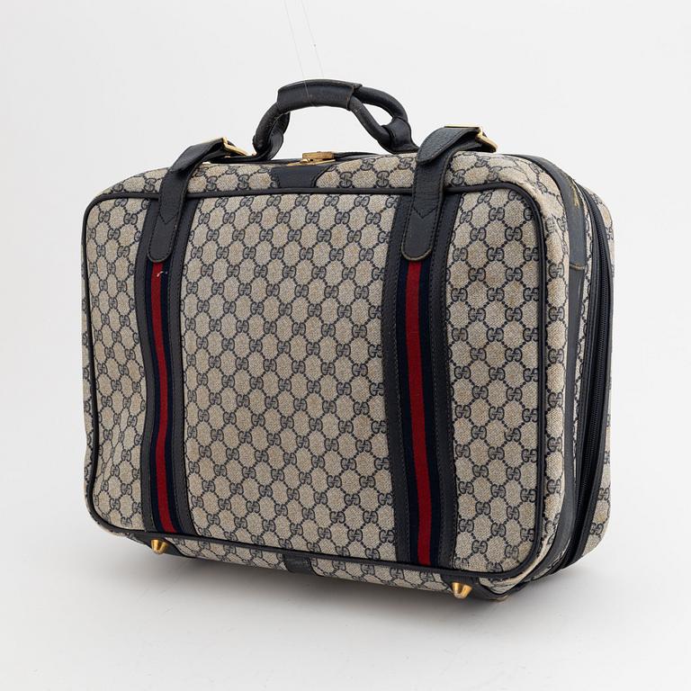 Gucci, resväska.