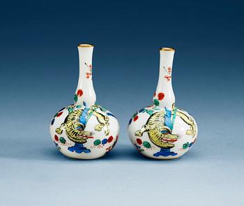 761. A pair of Meissen miniature vases, 19th Century.