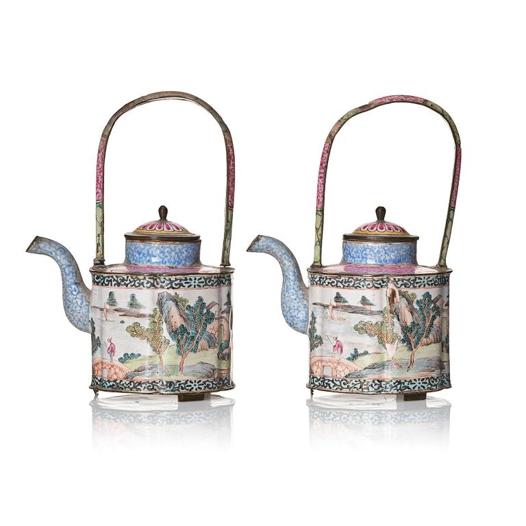 A Chinese pair of enamel on copper tea pots, Qing dynasty, Qianlong (1736-95).