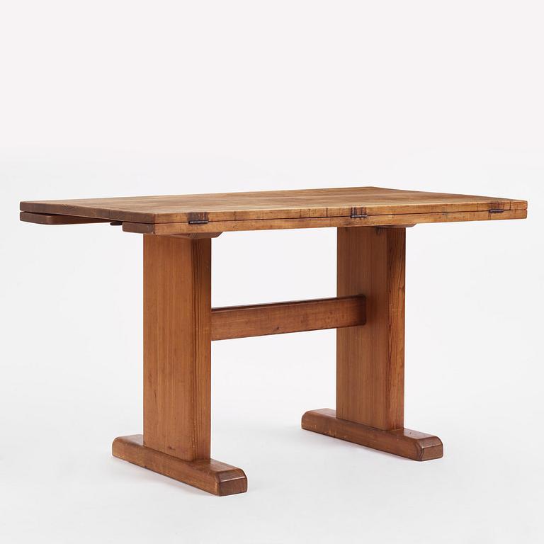 Carl Malmsten, a stained pine table, Sweden, 1930s.