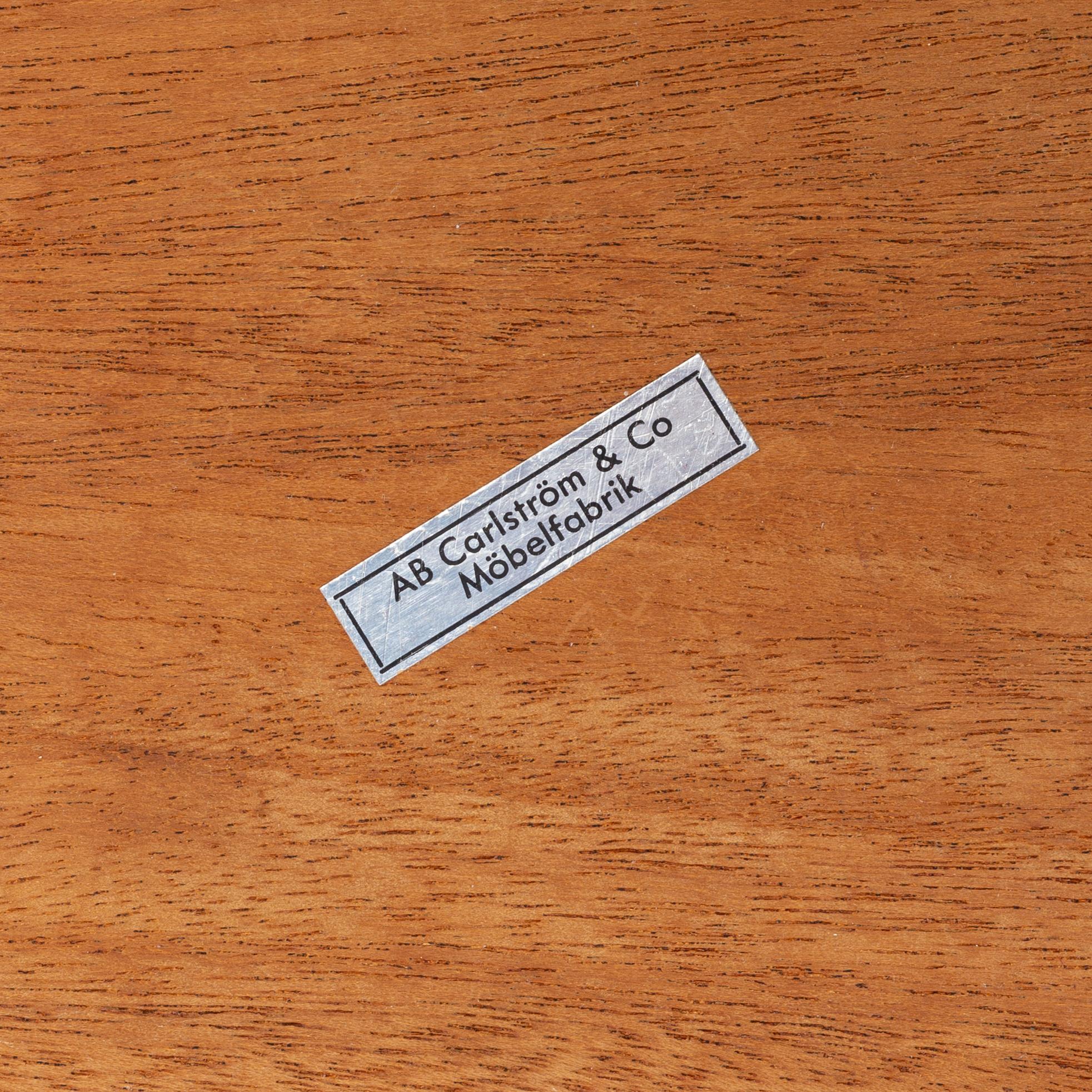 A pair of teak bedside tables, AB Carlströms & Co Möbelfabrik, 1950's/60's.