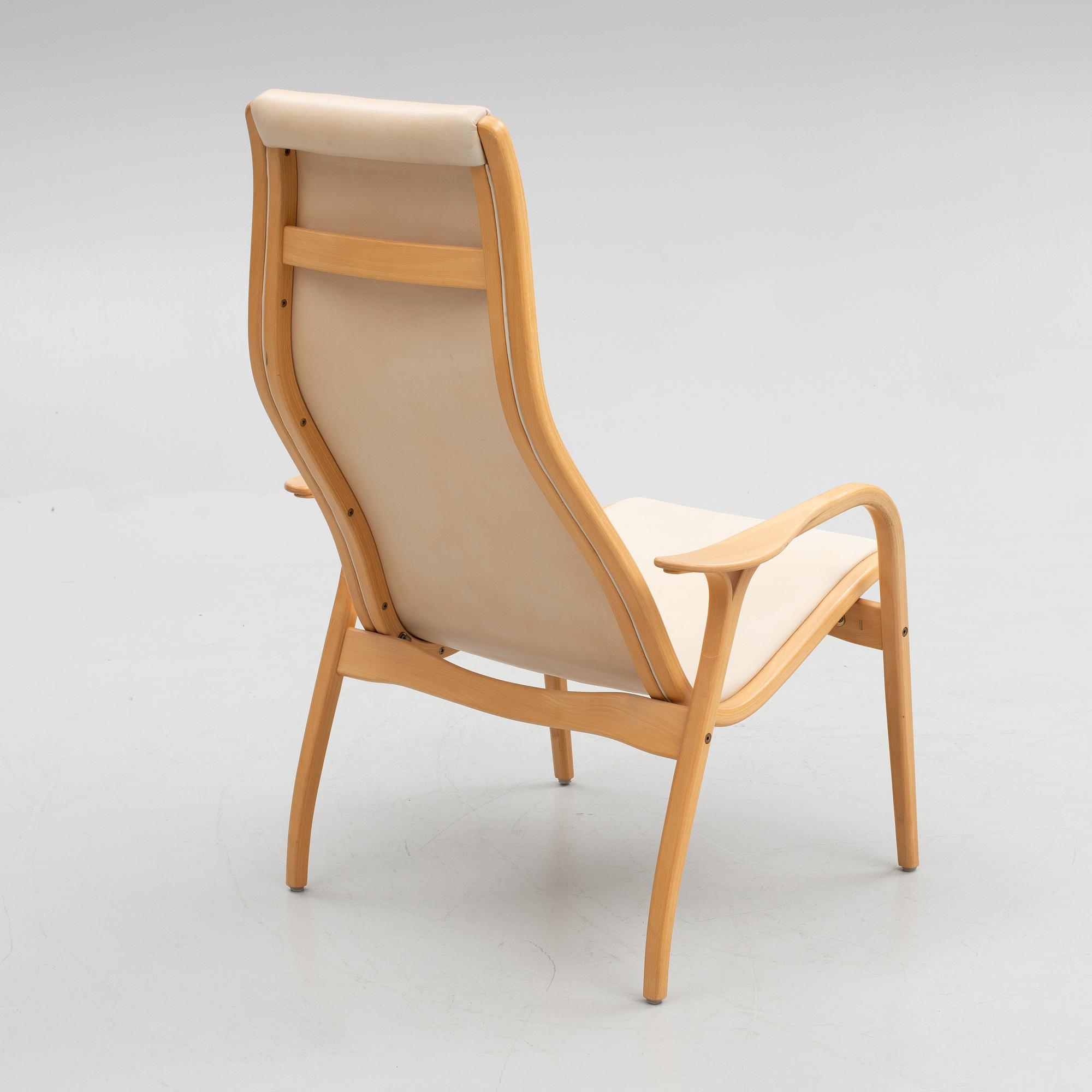 Yngve Ekström, fåtölj med fotpall, "Lamino", Swedese, tidigt 2000-tal.