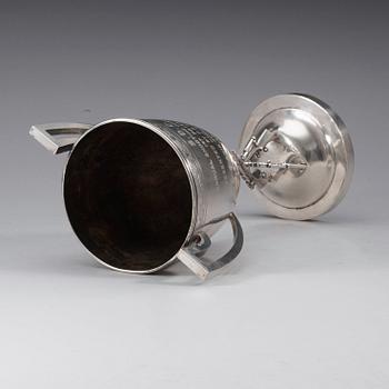 A silver cup with makers mark of Sing Fat, Canton, early 20th century.