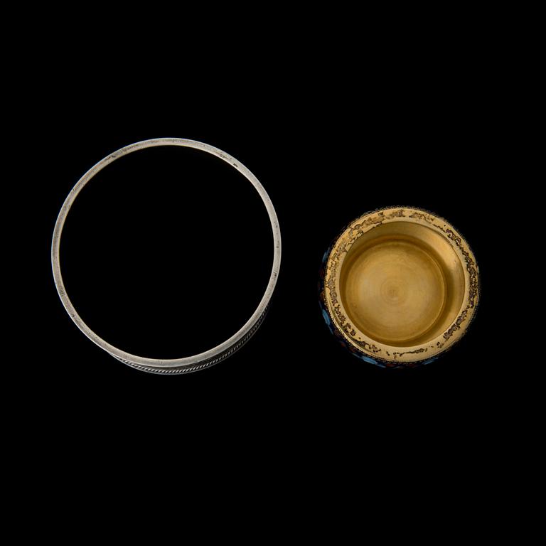 A mid-19th century silver napkin ring, Erik Kollin, St Petersburg, a silver salt cellar, latter half of the 20th century.