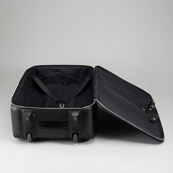 A black ardosie Leather Pégase 55 Suitcase.