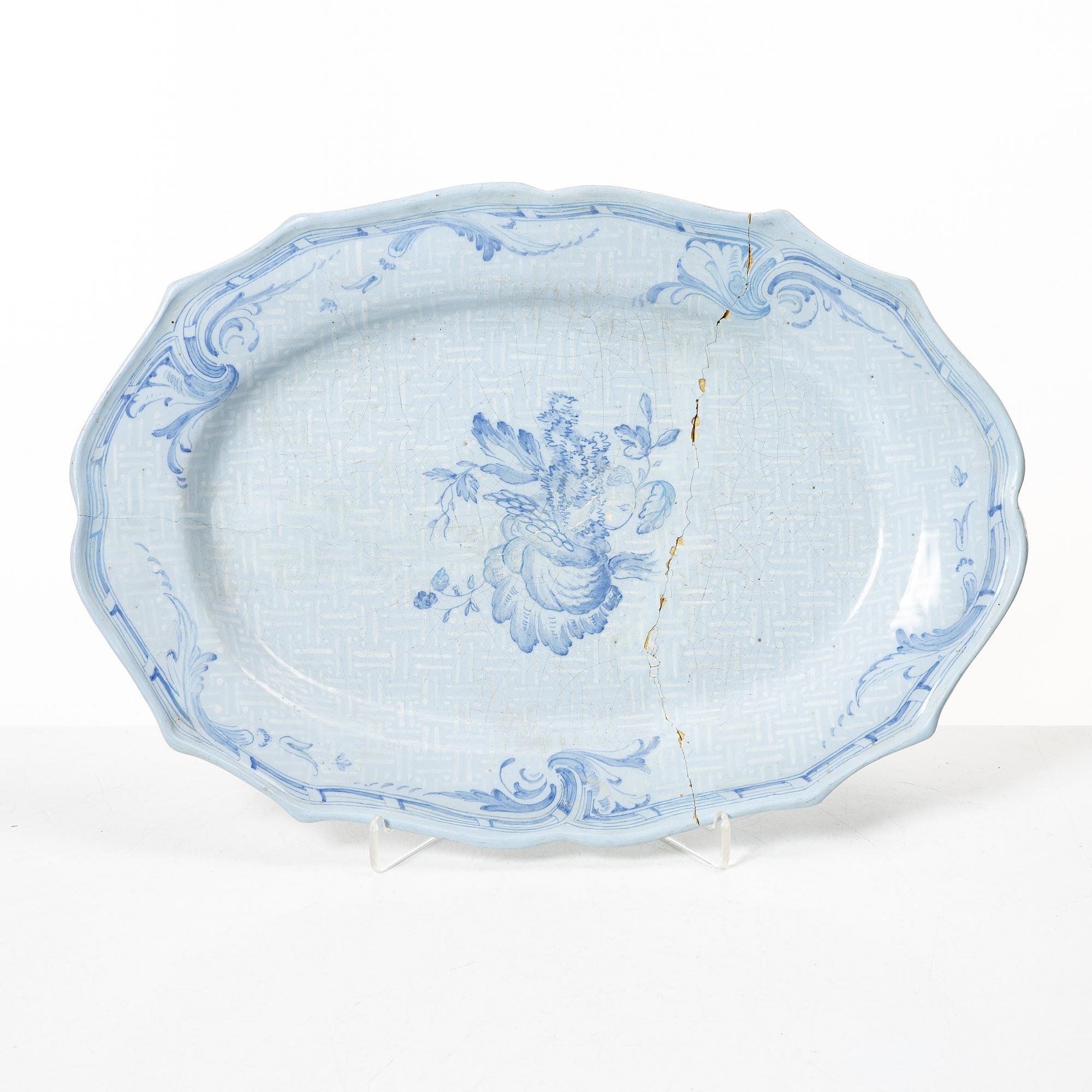 Rörstrand, A Rococo faience dish, dated 7/9 (17)55.