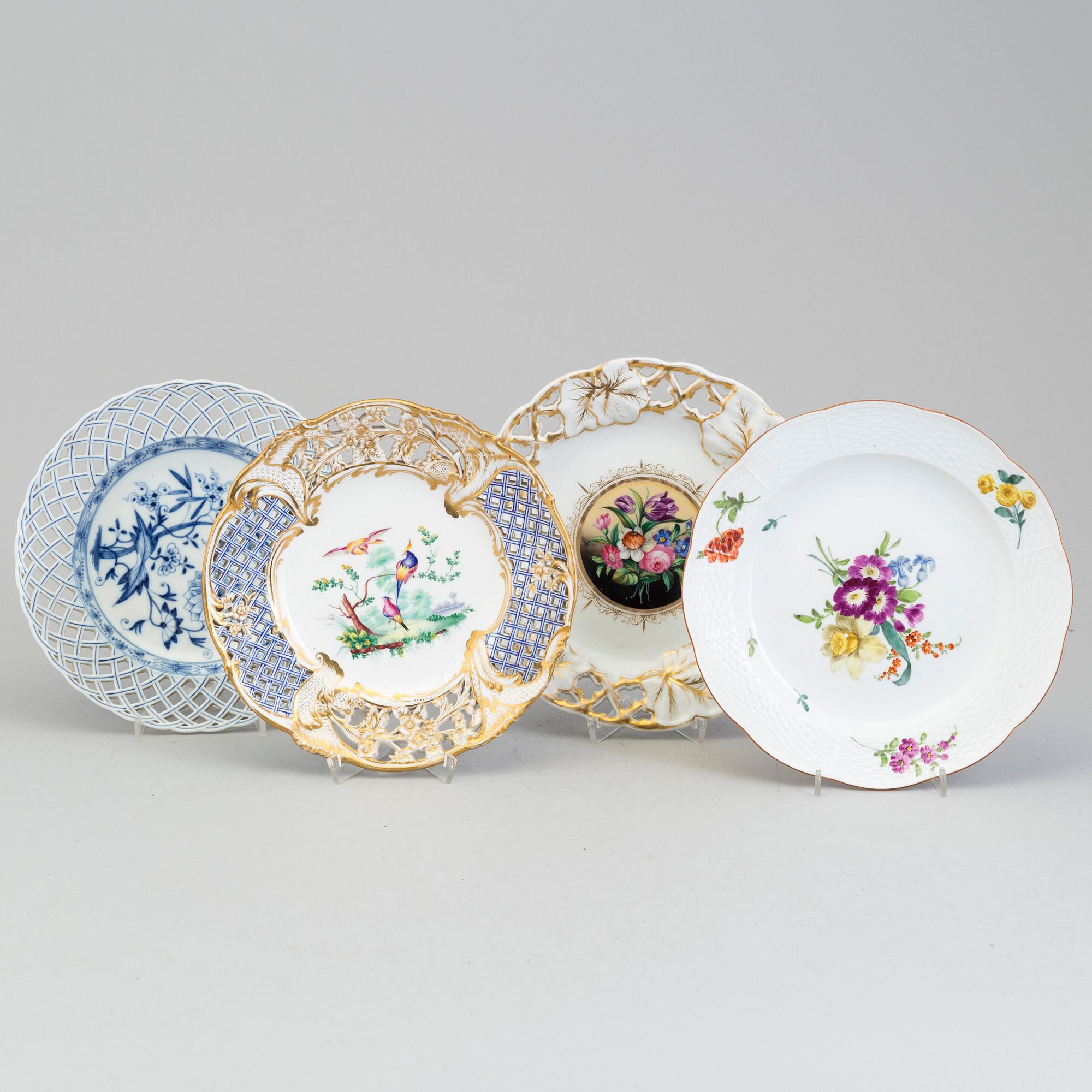 Four porcelain plates, Germany and France, 19th century.