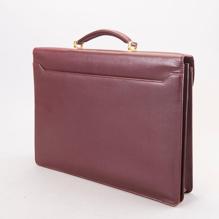 A Cartier leather briefcase.