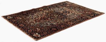 An antique Feraghan rug, Western Persia (Iran), c. 203 x 125 cm.