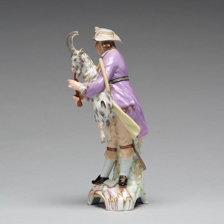 A Berlin porcelain figure of a man with a bagpipe in the shape of a goat, 18th Century.