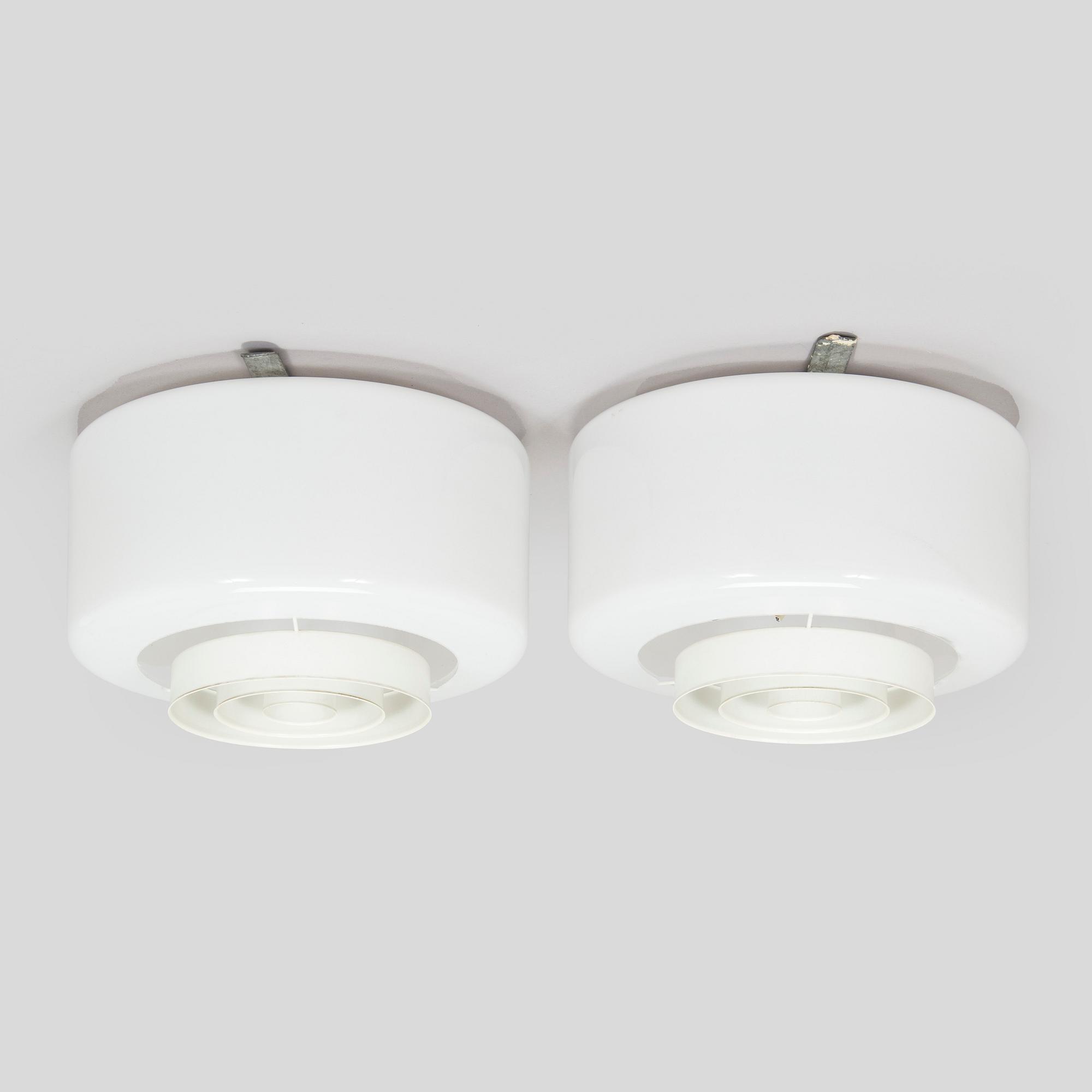 Paavo Tynell, kattovalaisimia, pari, A2-7. Idman 1900-luvun puoliväli.