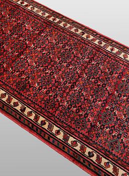 A Hosseinabad runner carpet, 508 x 105 cm.