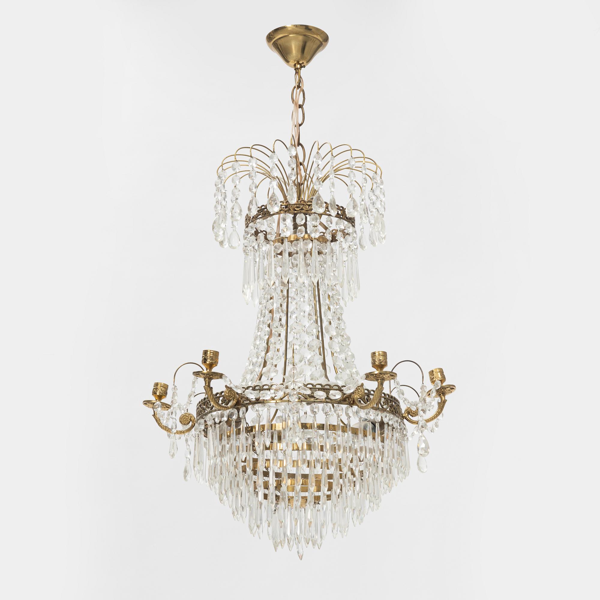 An Empire style chandelier, later part of the 20th Century.