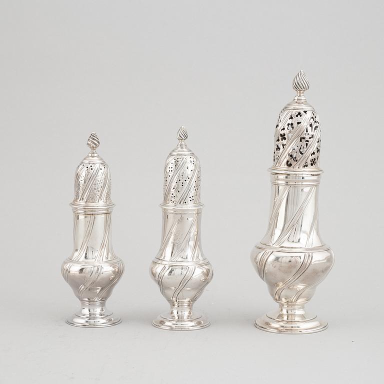 A set of three English 18th century silver sugar and spice casters, marked RP, London 1763.