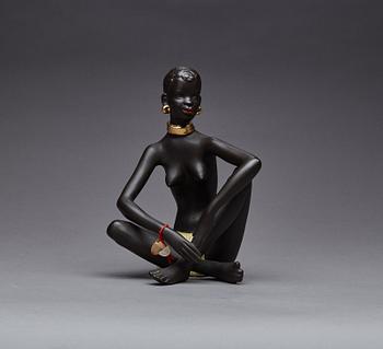 FIGURIN, etikettmärkt Goldscheider.