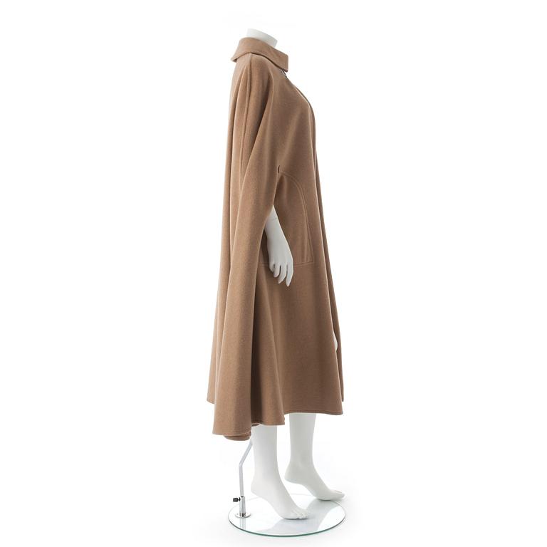 CÉLINE, a beige wool blend cape.